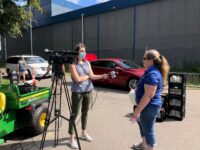 Judi Woman being interviewed for the news